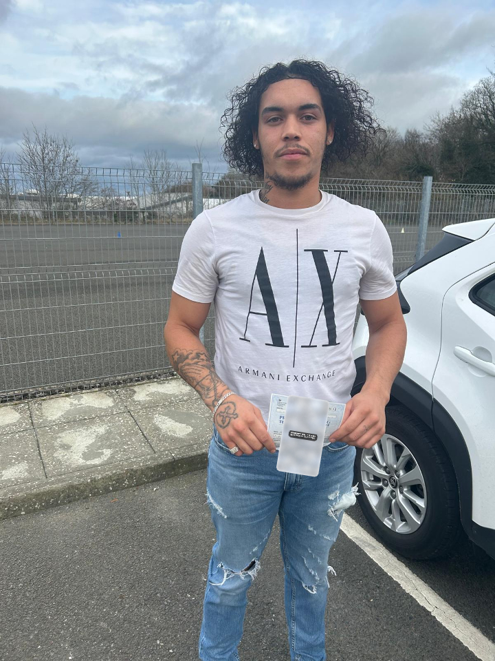 Passed learner holding a privacy-protected practical driving test certificate
